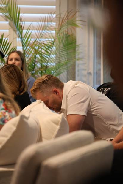 A sacred moment of prayer, humility, and consecration.